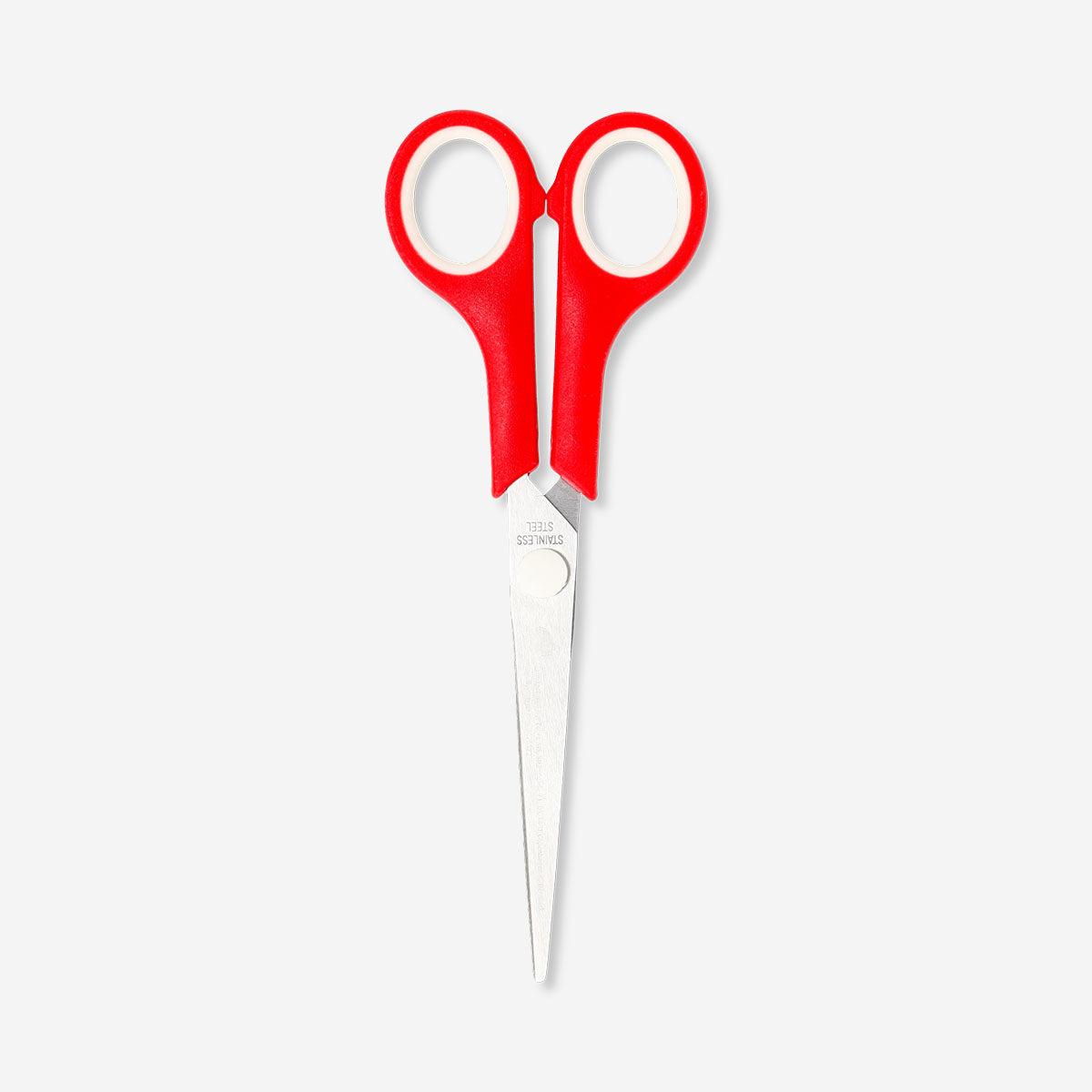Red office scissors from Flying Tiger Copenhagen with sharp blades and ergonomic handles for precise cutting.