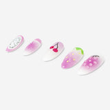 Flying Tiger Copenhagen press-on nails with berry design, showcasing colorful, stylish nail art for personal care.