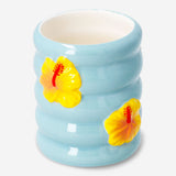 Ceramic tooth mug with hibiscus flower print, Flying Tiger Copenhagen home decor, featuring a detailed floral design.