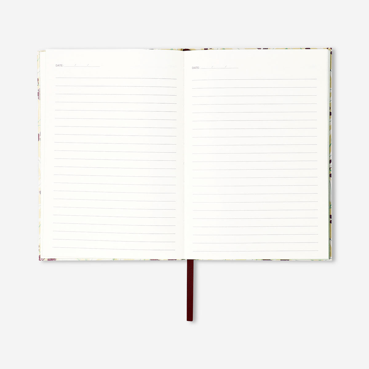 A5 floral notebook from Flying Tiger Copenhagen with colorful floral cover and lined pages for office use.