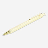 Gold ballpoint pen from Flying Tiger Copenhagen, sleek office writing instrument with a shiny metallic finish.
