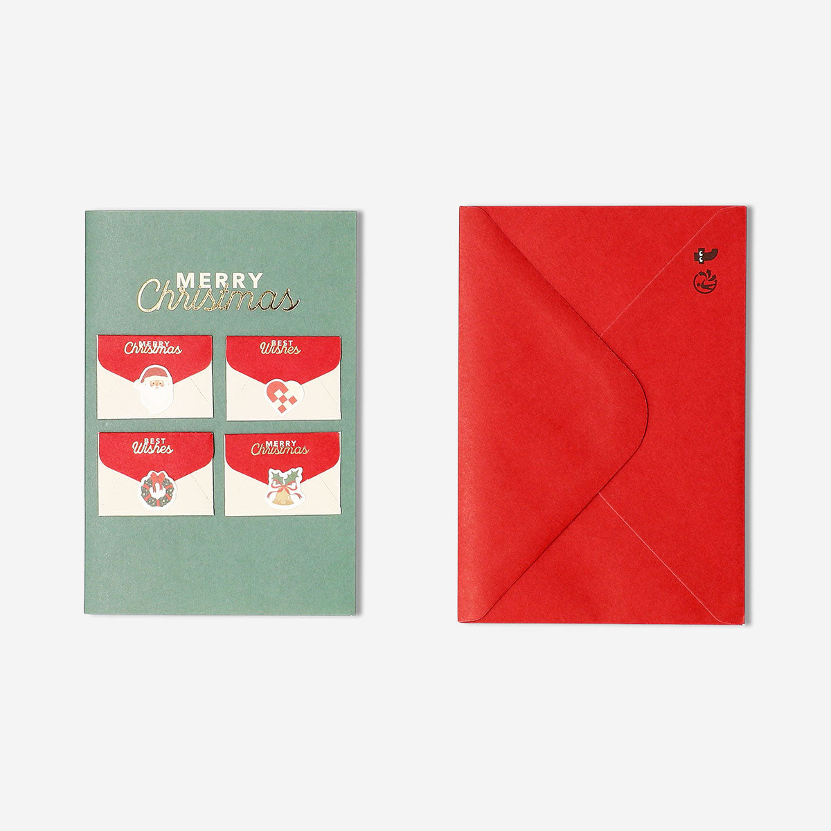 Christmas card with mini envelopes from Flying Tiger Copenhagen, featuring festive holiday design and four small paper envelopes.