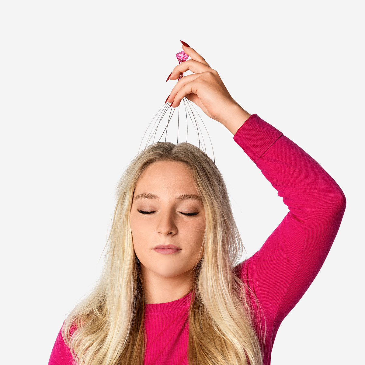 Flying Tiger Copenhagen striped head massager with diamond design, compact gadget for relaxing scalp massage.