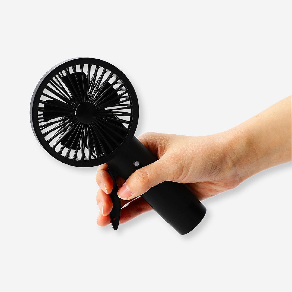 Black mist spray fan gadget by Flying Tiger Copenhagen, showing a compact device with a spray nozzle and fan blades for cooling.
