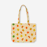 Textile tote bag with autumn leaves design by Flying Tiger Copenhagen, featuring a natural fabric appearance and leaf pattern.