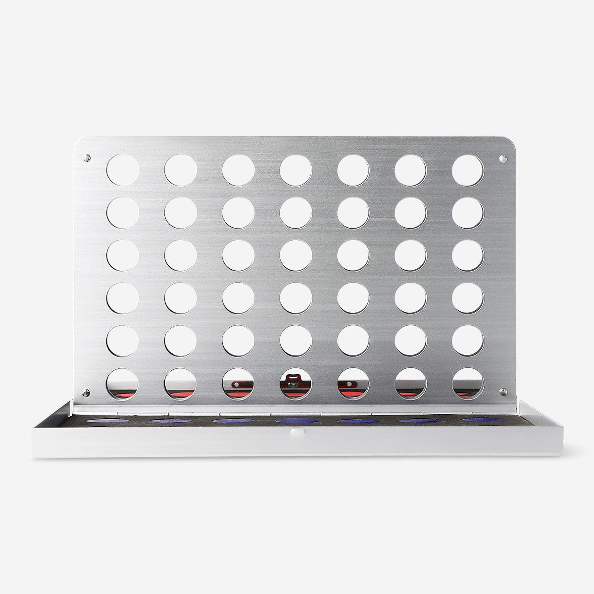 Metal Four in a Row game by Flying Tiger Copenhagen, featuring a vertical game board with metal discs for two players.