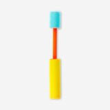 Small Flying Tiger Copenhagen toy water pump, 20 cm tall, with colorful plastic components and a hand-operated pump mechanism.