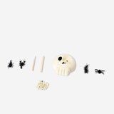 Flying Tiger Copenhagen excavation kit with a skull design, a fun toy for digging and discovering hidden treasures.