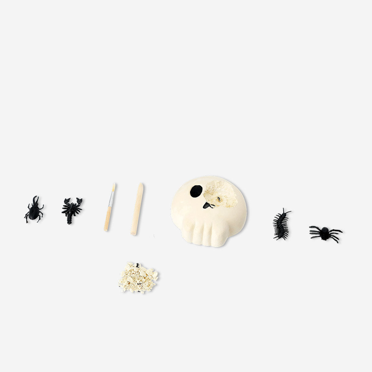 Flying Tiger Copenhagen excavation kit with a skull design, a fun toy for digging and discovering hidden treasures.