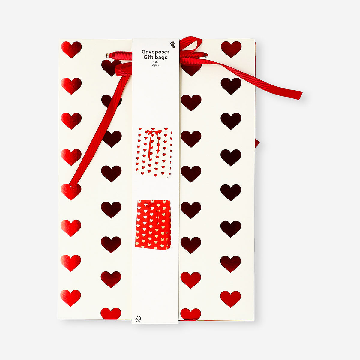 Two foil hearts gift bags in vibrant colors from Flying Tiger Copenhagen, ideal for office gift wrapping.