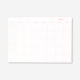 Flying Tiger Copenhagen B5 floral monthly planner with colorful floral cover and weekly layout for office organization.