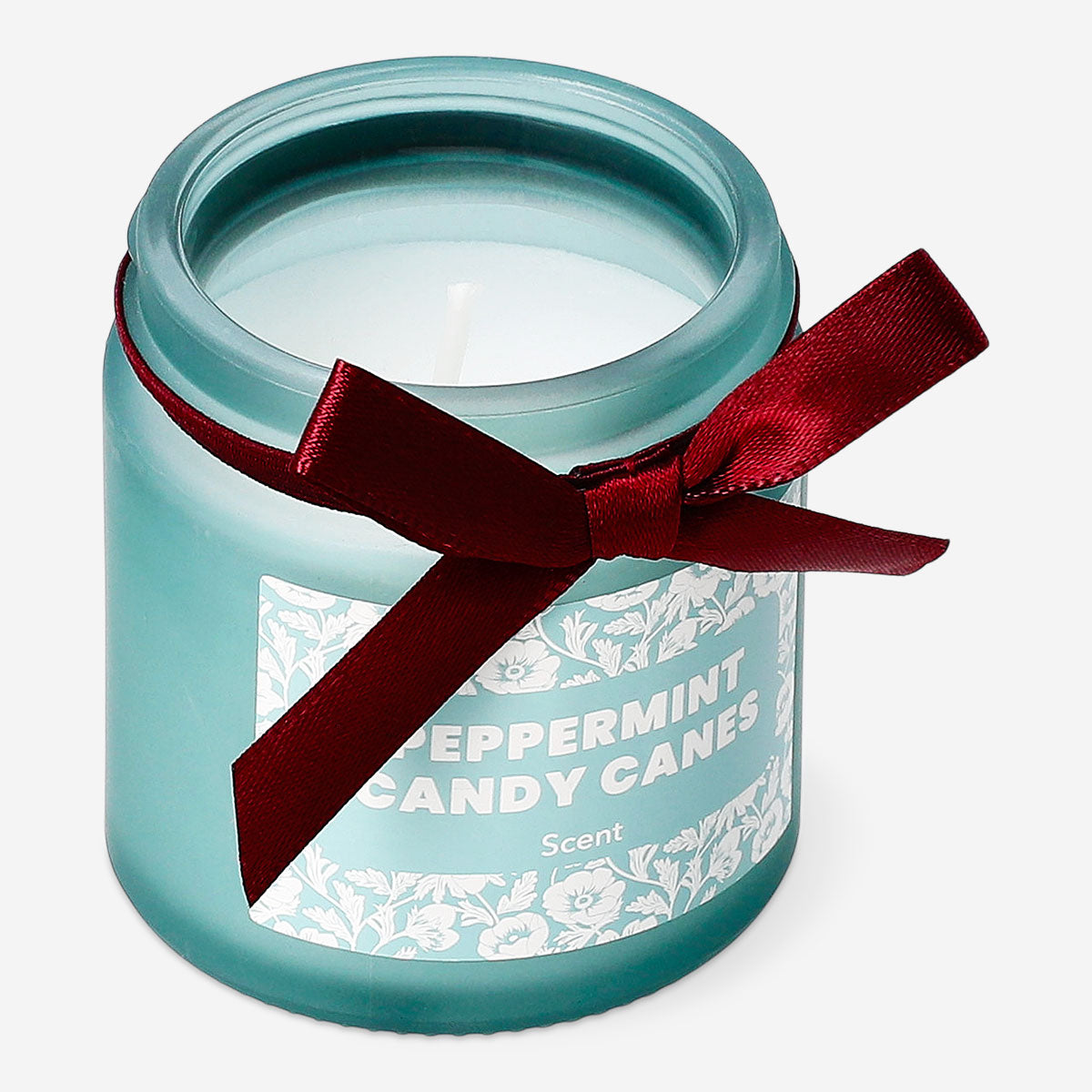 Flying Tiger Copenhagen scented candle with candy cane fragrance, featuring a festive holiday design and warm glow.