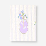 Set of three Flying Tiger Copenhagen A5 floral notebooks with colorful cover designs for office or note-taking use.