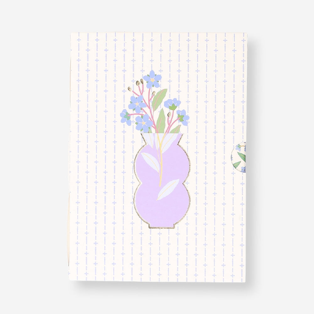 Set of three Flying Tiger Copenhagen A5 floral notebooks with colorful cover designs for office or note-taking use.