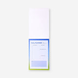 Blue Flying Tiger Copenhagen daily planner notepad for office use, featuring a neatly organized layout and compact design.