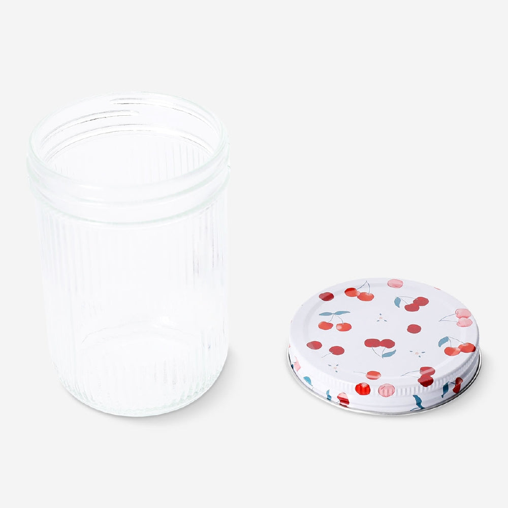 Glass storage jar with cherry print lid, 16 cm, suitable for kitchen storage, by Flying Tiger Copenhagen.