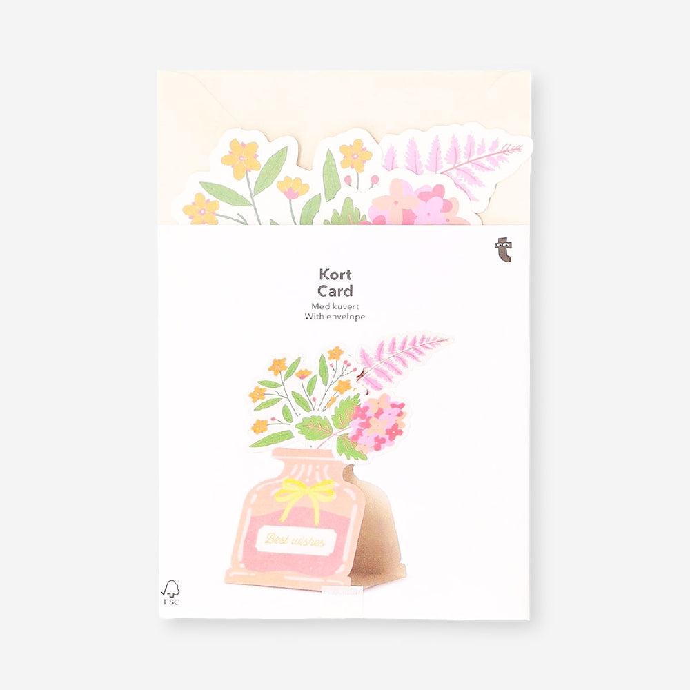 Office greeting card from Flying Tiger Copenhagen featuring a floral design and a vase with colorful flowers.