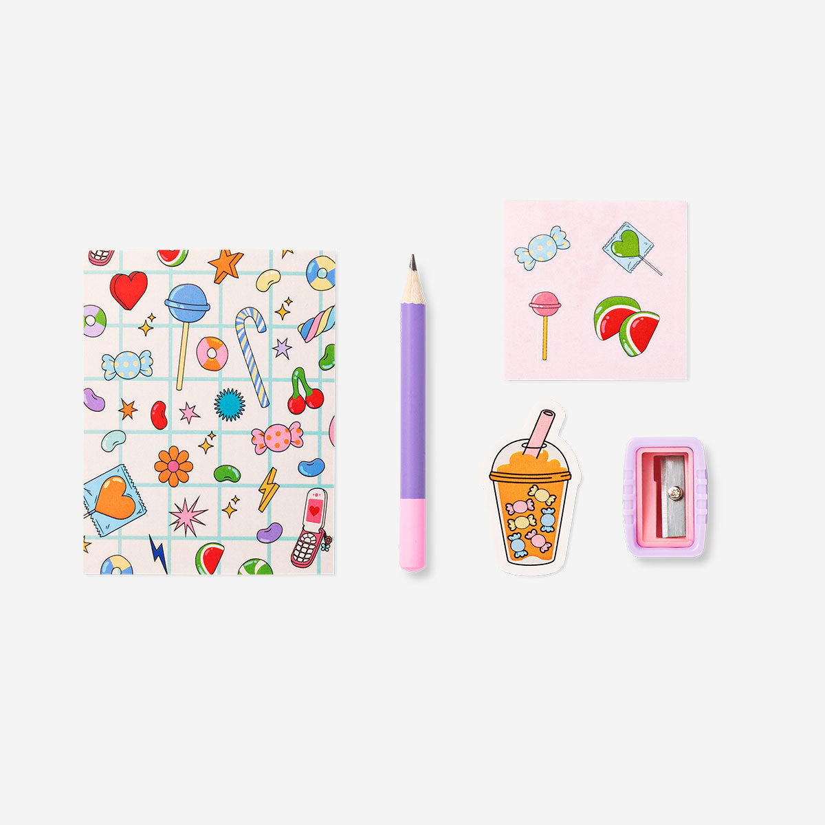 Candy-themed mini backpack stationery kit from Flying Tiger Copenhagen featuring colorful office supplies and playful design.