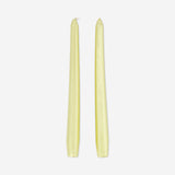 Two gold dinner candles from Flying Tiger Copenhagen, elegant home decor candles with a shiny metallic finish.