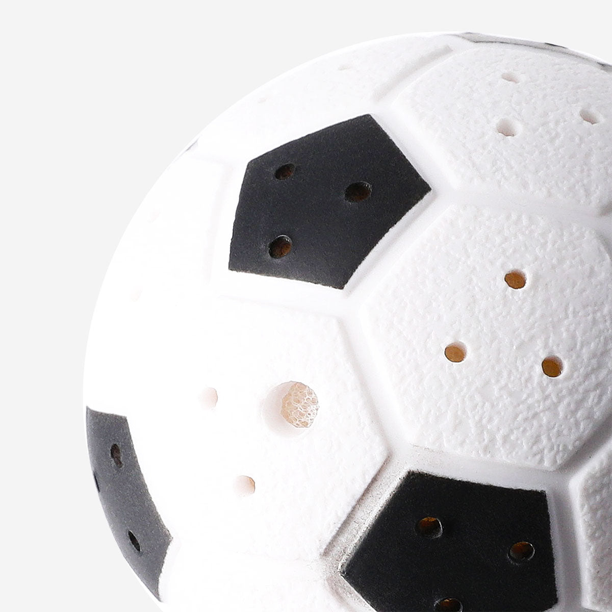 Water play football toy by Flying Tiger Copenhagen, colorful rubber football designed for water-based fun and outdoor play.