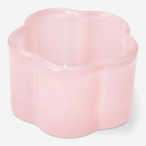Milky pink glass tealight holder for home decor, designed by Flying Tiger Copenhagen, with a smooth, rounded shape.