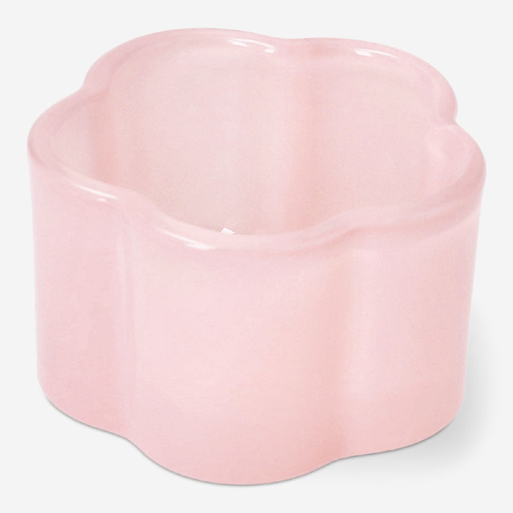 Milky pink glass tealight holder for home decor, designed by Flying Tiger Copenhagen, with a smooth, rounded shape.
