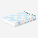 Blue chequered spiral bound notepad