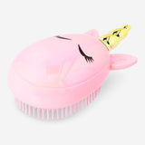Flying Tiger Copenhagen unicorn hairbrush with colorful bristles and ergonomic handle for personal hair care.