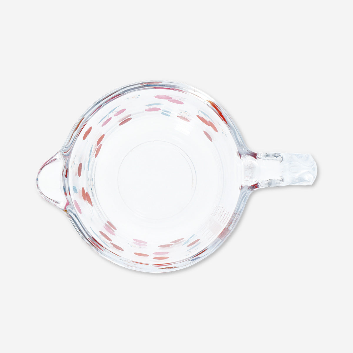 Kitchen measuring cup with cherry print by Flying Tiger Copenhagen, featuring clear markings and a colorful cherry design.