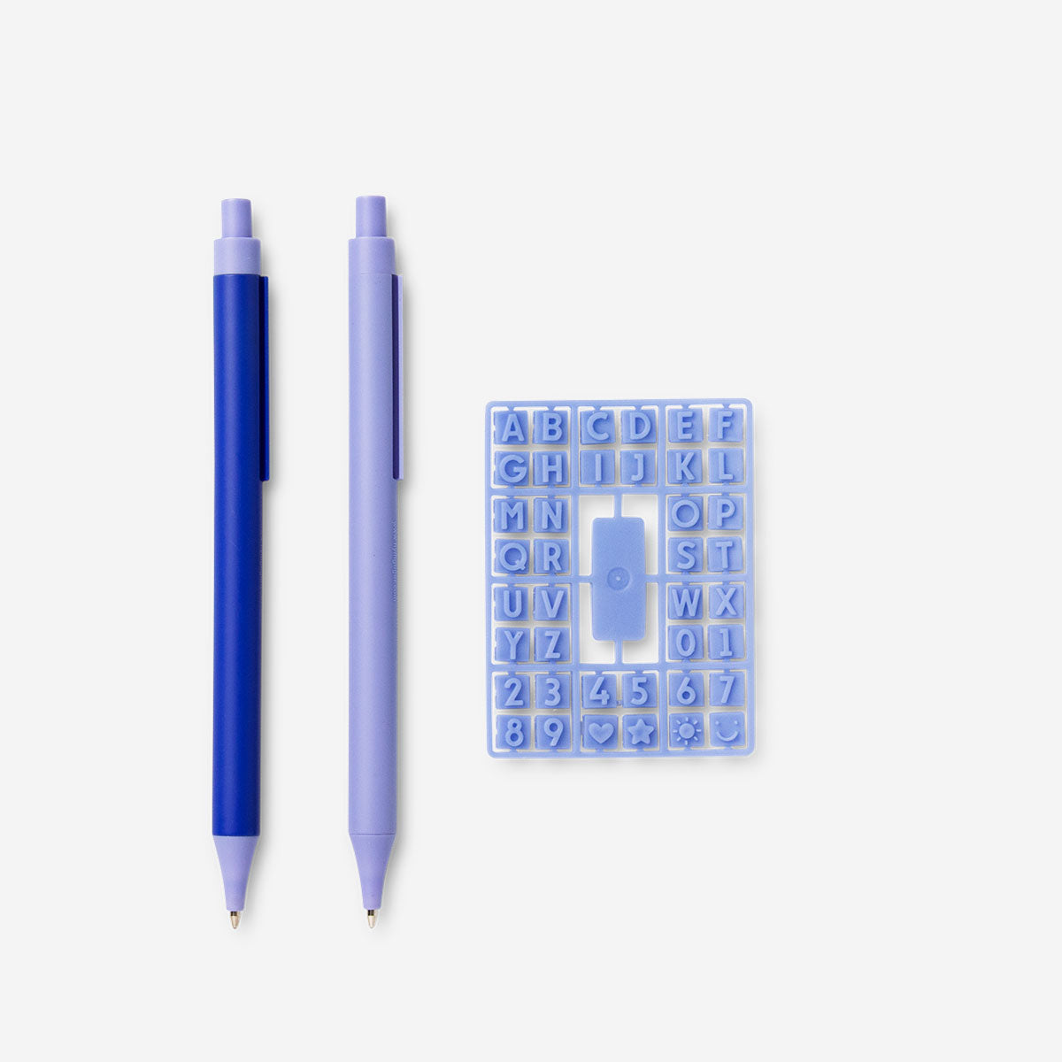 Two Flying Tiger Copenhagen office ballpoint pens with letter designs, featuring colorful ink and comfortable grip.