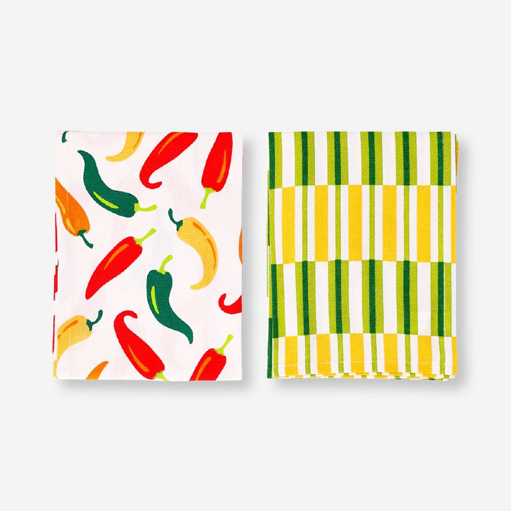 Set of two Flying Tiger Copenhagen kitchen tea towels featuring chili and stripe patterns, perfect for adding color to your kitchen.