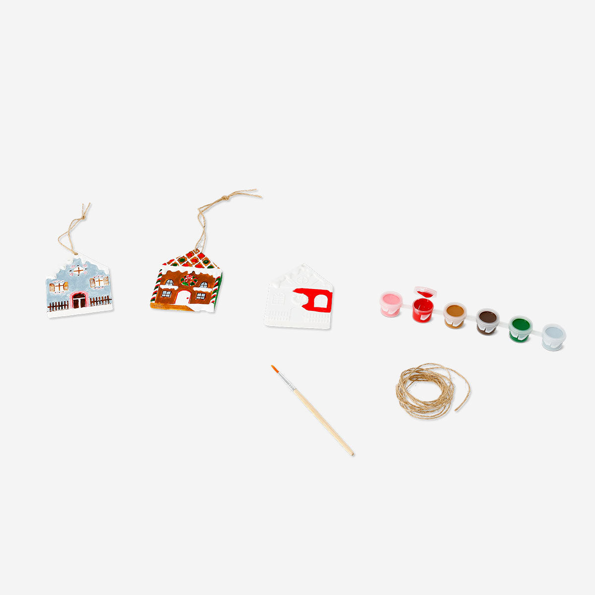 Set of three DIY ceramic house ornaments for crafting, by Flying Tiger Copenhagen, featuring small decorative house shapes for hobbies.
