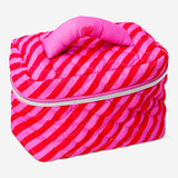 Pink striped quilted toiletry bag from Flying Tiger Copenhagen, 13x19 cm, designed for personal care and travel organization.