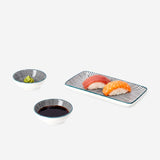 Three-piece kitchen serving tray set with soy sauce bowls from Flying Tiger Copenhagen, featuring a sleek and functional design.