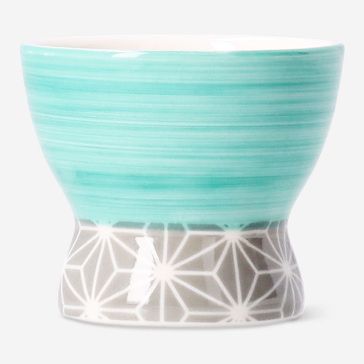 Multi-coloured 40ml sake cup from Flying Tiger Copenhagen, small kitchen drinkware with vibrant design.