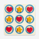 Flying Tiger Copenhagen Tick-Tack-Toe game with colorful wooden pieces and game board for fun, classic tic-tac-toe gameplay.