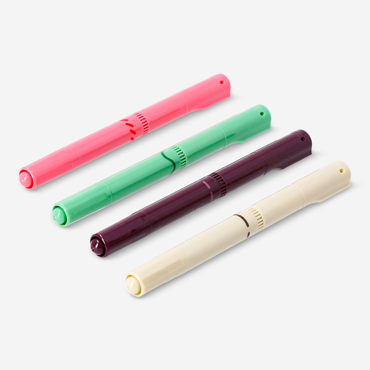 Set of four Flying Tiger Copenhagen dual-tip markers for journaling, featuring colorful ink and versatile tips for creative writing.