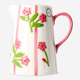 Colorful 1L hand-painted striped and flower design ceramic jug by Flying Tiger Copenhagen for kitchen use.