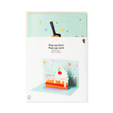 Flying Tiger Copenhagen birthday card with a pop-up slice of cake design, perfect for celebrating special occasions.