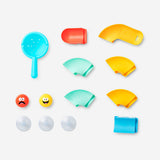 Colorful DIY ball run game by Flying Tiger Copenhagen featuring wooden tracks and balls for creative building fun.