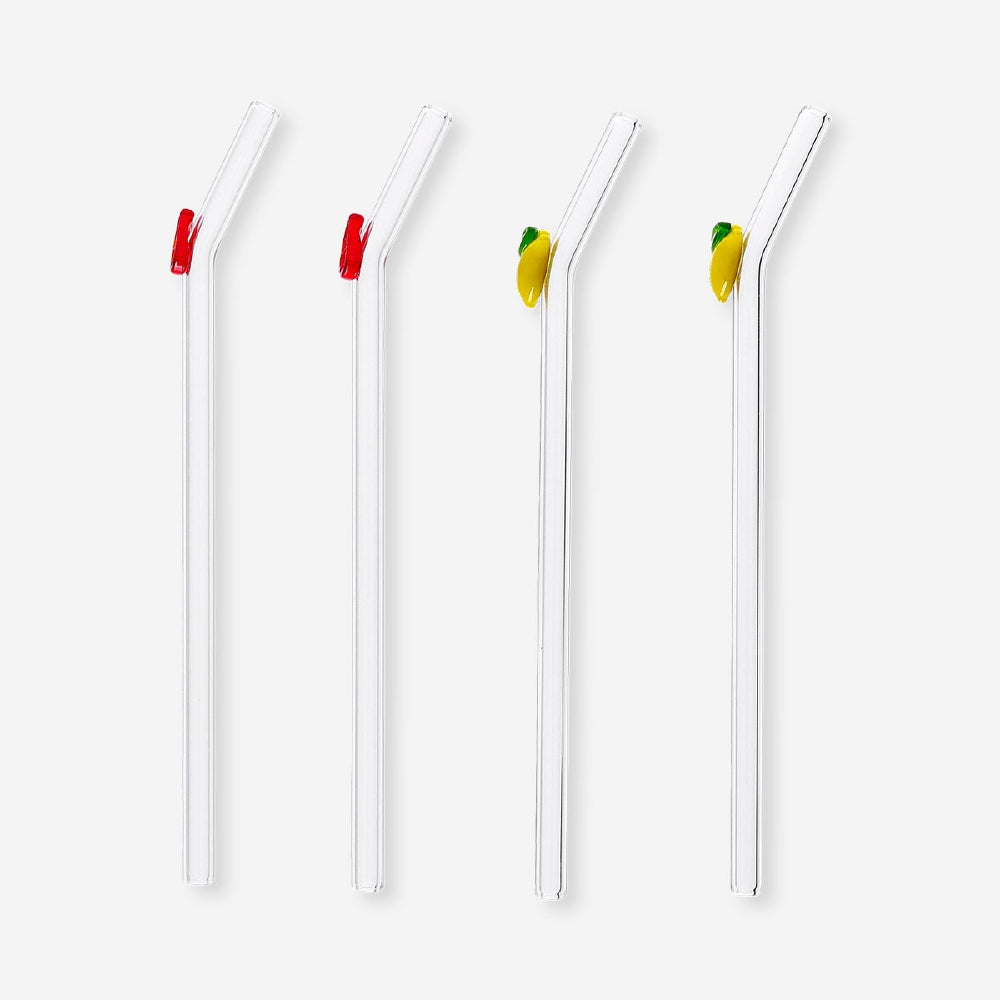 Set of four glass kitchen straws with colorful fruit decorations from Flying Tiger Copenhagen, perfect for stylish drinks.
