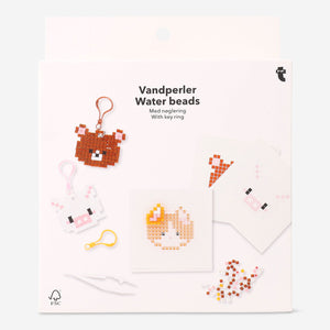 Water beads kit with colorful water beads and keyrings from Flying Tiger Copenhagen, perfect for crafting and sensory play.
