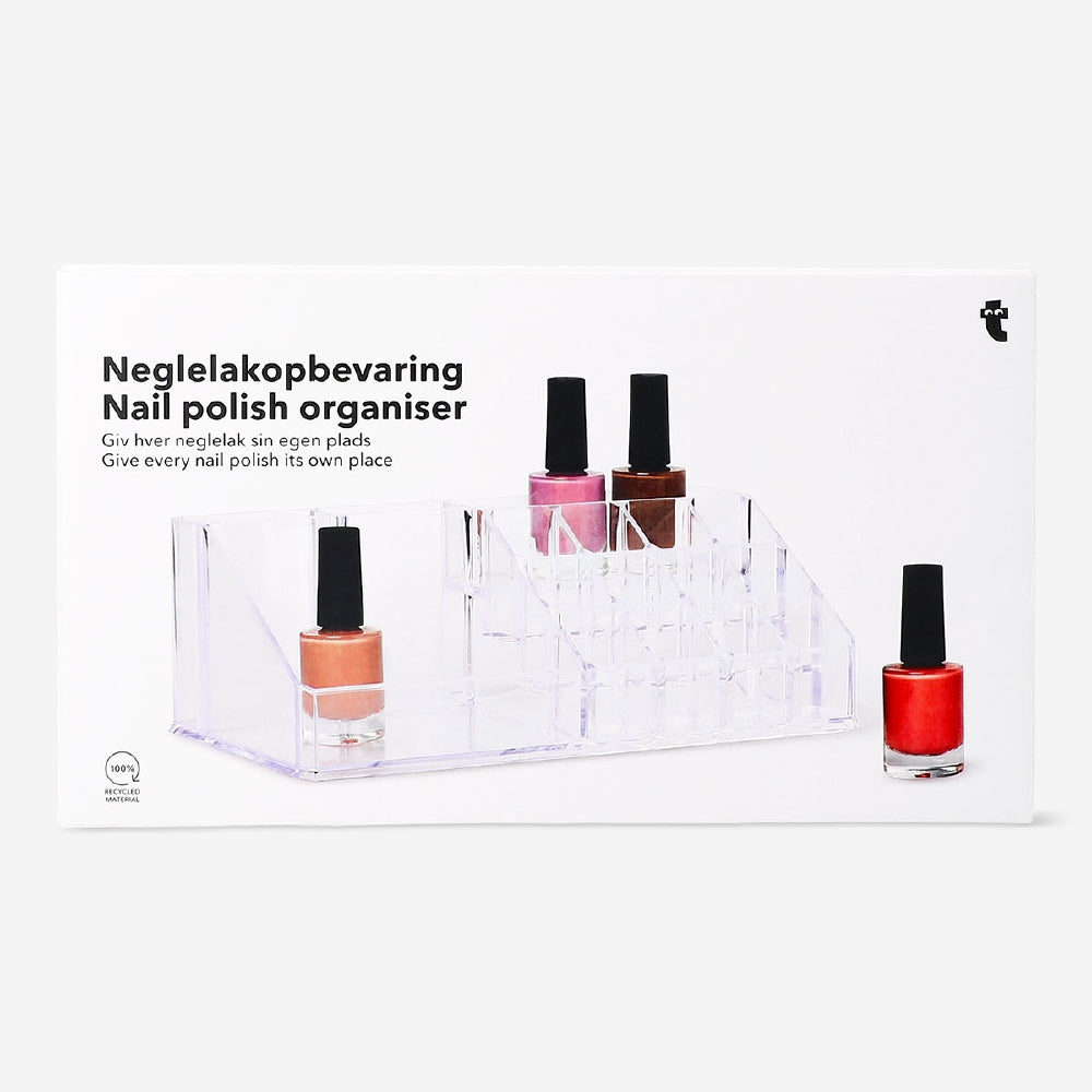 Clear nail polish organiser from Flying Tiger Copenhagen, 12.5x22 cm, with compartments for storing nail polish bottles and tools.