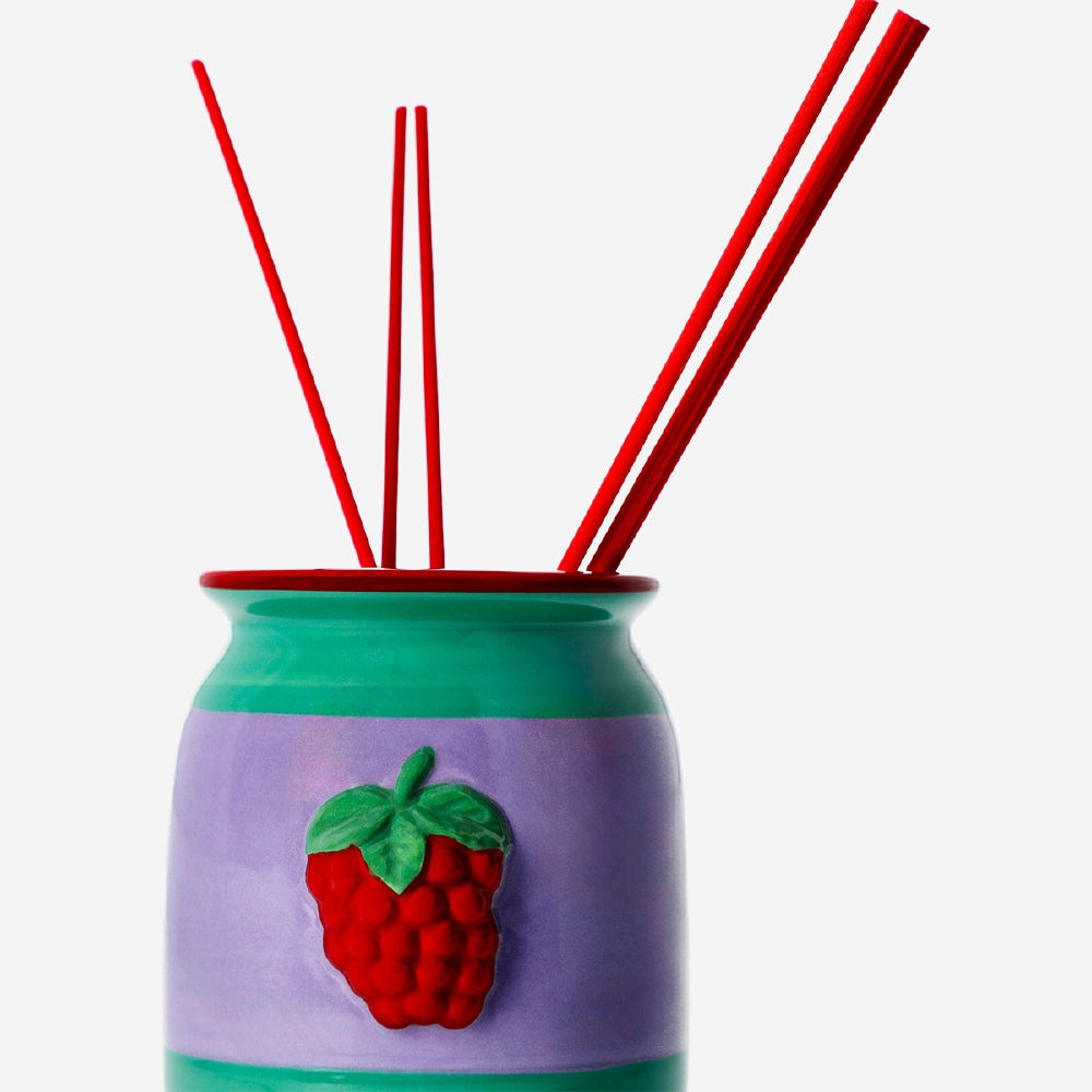 Flying Tiger Copenhagen raspberry-scented reed diffuser in a 200ml glass bottle, ideal for home fragrance and decor.
