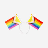 Rainbow flag hairband for adults, colorful party accessory by Flying Tiger Copenhagen, featuring vibrant rainbow stripes.