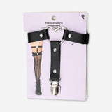 Two pairs of black adjustable textile suspenders with metal clasps from Flying Tiger Copenhagen, displayed flat.