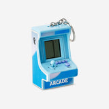 Blue arcade game keyring gadget from Flying Tiger Copenhagen with a miniature retro arcade machine design.