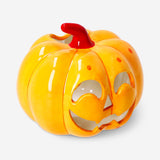 Flying Tiger Copenhagen LED pumpkin candle holder, 14 cm tall, with warm glowing light and carved pumpkin design for home decor.