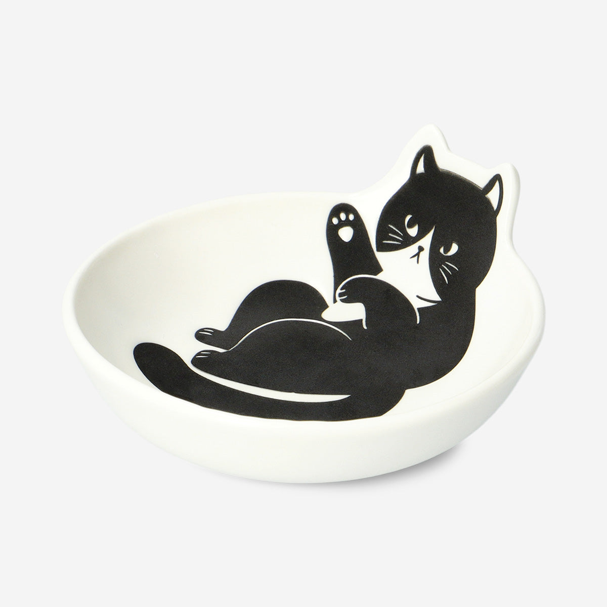 White ceramic kitchen bowl with a cute cat design, 10 cm diameter, from Flying Tiger Copenhagen.