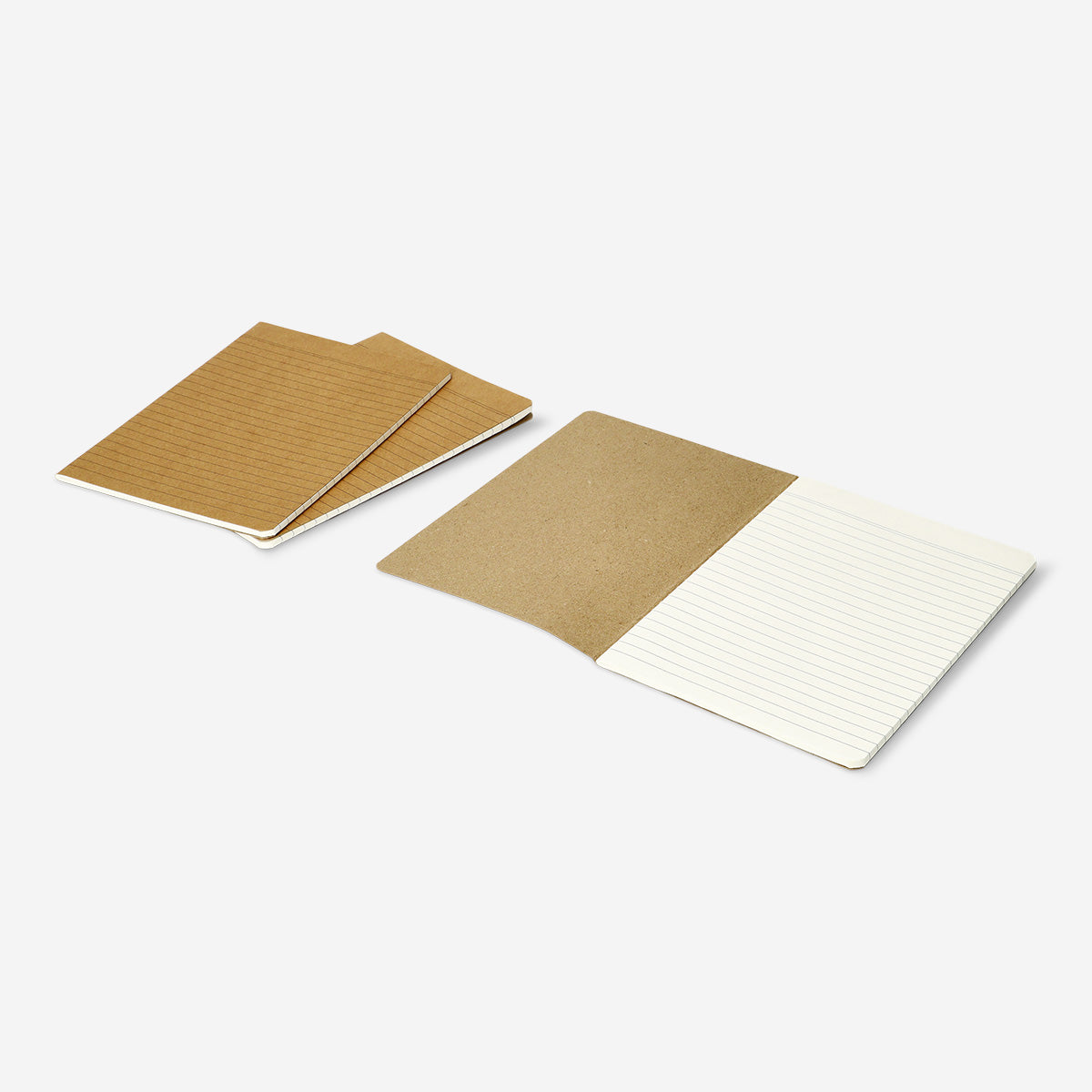 Three A5 lined exercise books from Flying Tiger Copenhagen with spiral binding and colorful covers, ideal for note-taking and journaling.